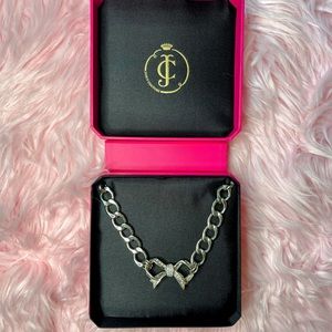 Sterling silver Juicy Couture rhinestone bow necklace.